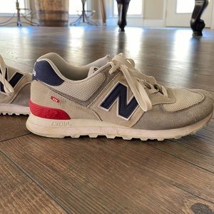 Mens New Balance 574 size 8.5. Gray, blue & red.